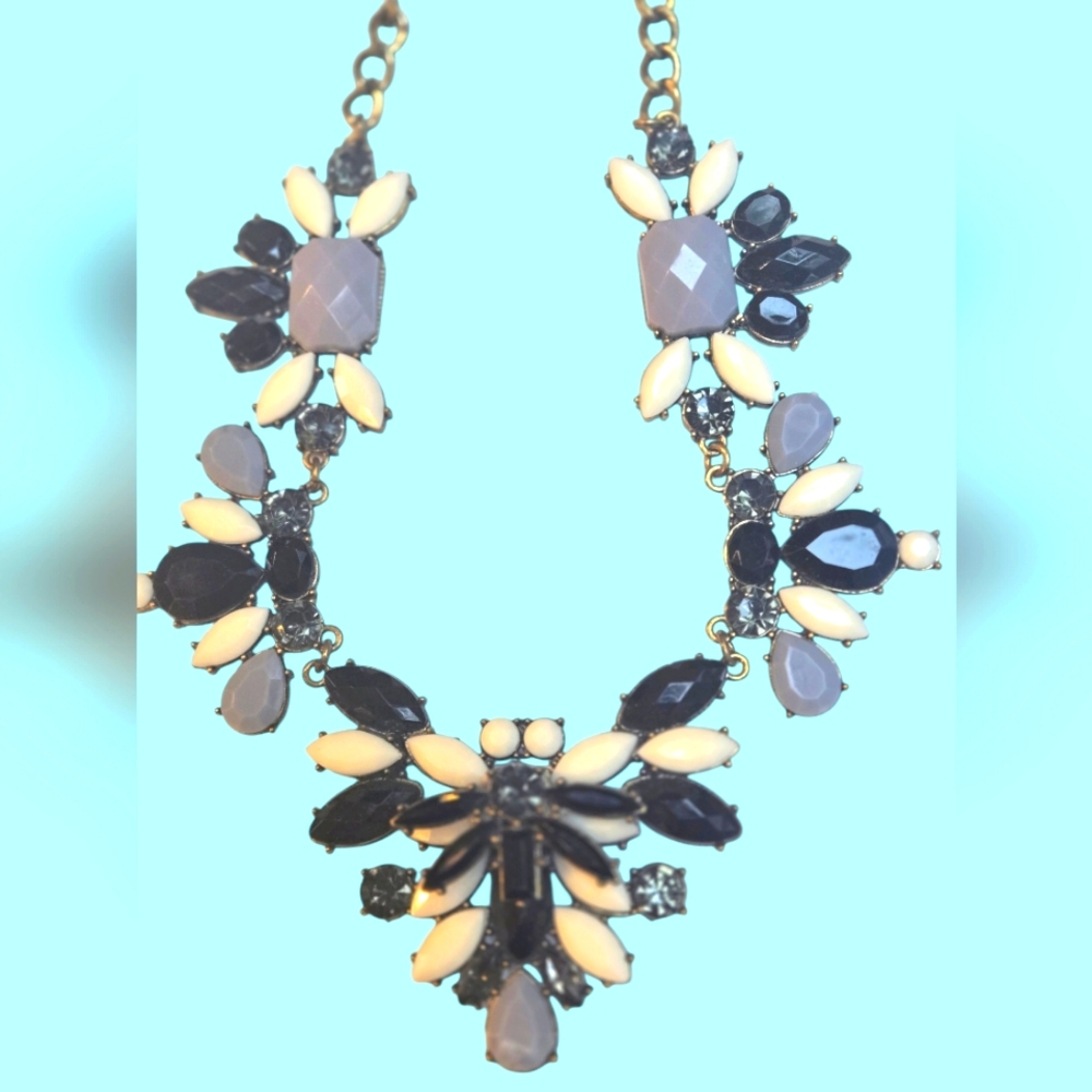 Black, grey, and white jeweled costume necklace.  Adjustable length.  Approx 10"
